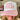 foam trucker hat in light pink and white, with mesh back and snapback closure, with Dolly Reba 2024 Make America Country Again printed in red on the front