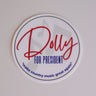 round sticker with Dolly for President: Make Country Music Great Again design in red and blue printed on the front
