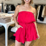 strapless tube top gauzy romper in red with elastic tied waist and ruffle detail on shorts, plus side pockets