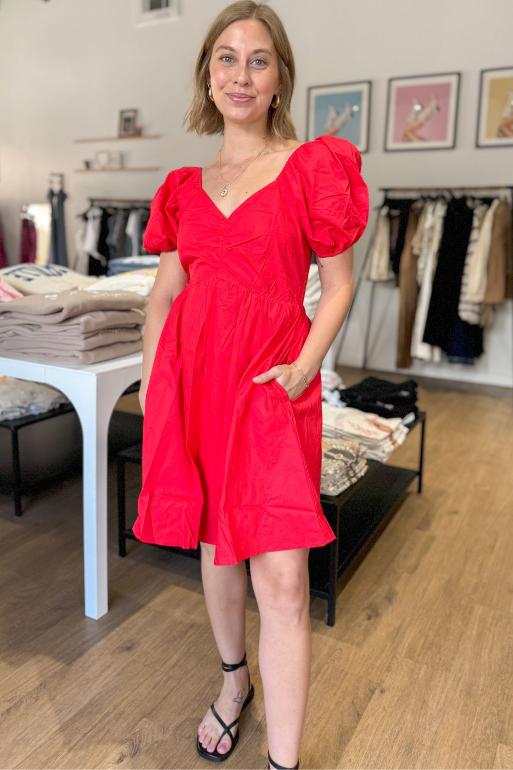 cherry red puff sleeve dress with sweetheart neckline and ruched back, plus side pockets