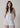 The Delilah Halter Denim Romper - White