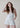 The Delilah Halter Denim Romper - White